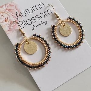 Handmade dark metallic rainbow and gold beaded earrings